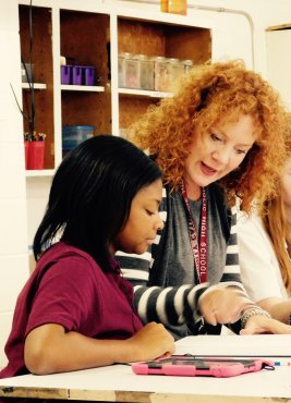 Former AT&T Professional, Laura Lebeda, began her teaching career in August at Trinity Catholic High School in North St. Louis County