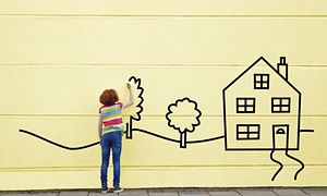 girl drawing on wall