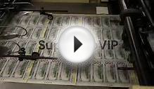 Close up of money printing press. Newly redesigned $100 n